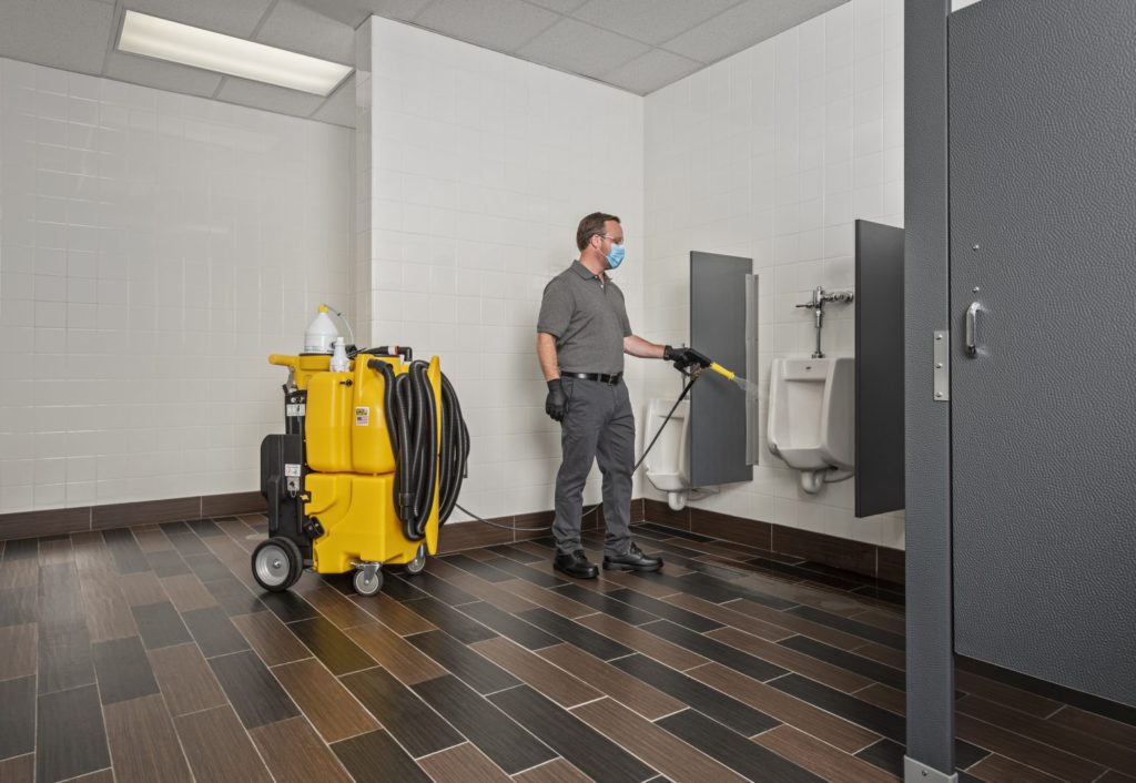 No Touch Cleaning system KaiVac 1750 cleaning a restroom urinal